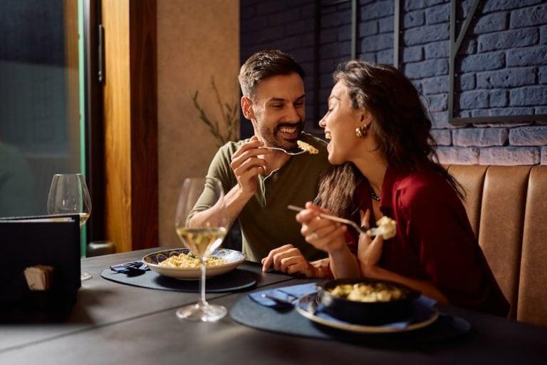 Couple sharing a meal at one of the best dinner restaurants in Sathorn, Bangkok