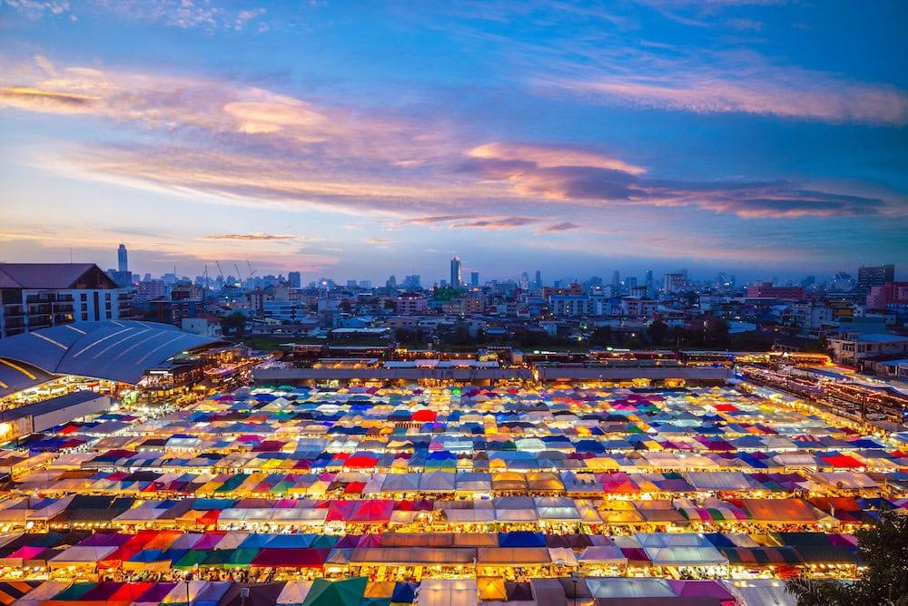 Colorful tents at Rot Fai Market Ratchada seen from above at night