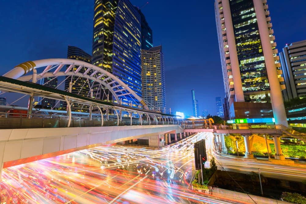 The BTS and MRT covered skywalk networks in Bangkok at night