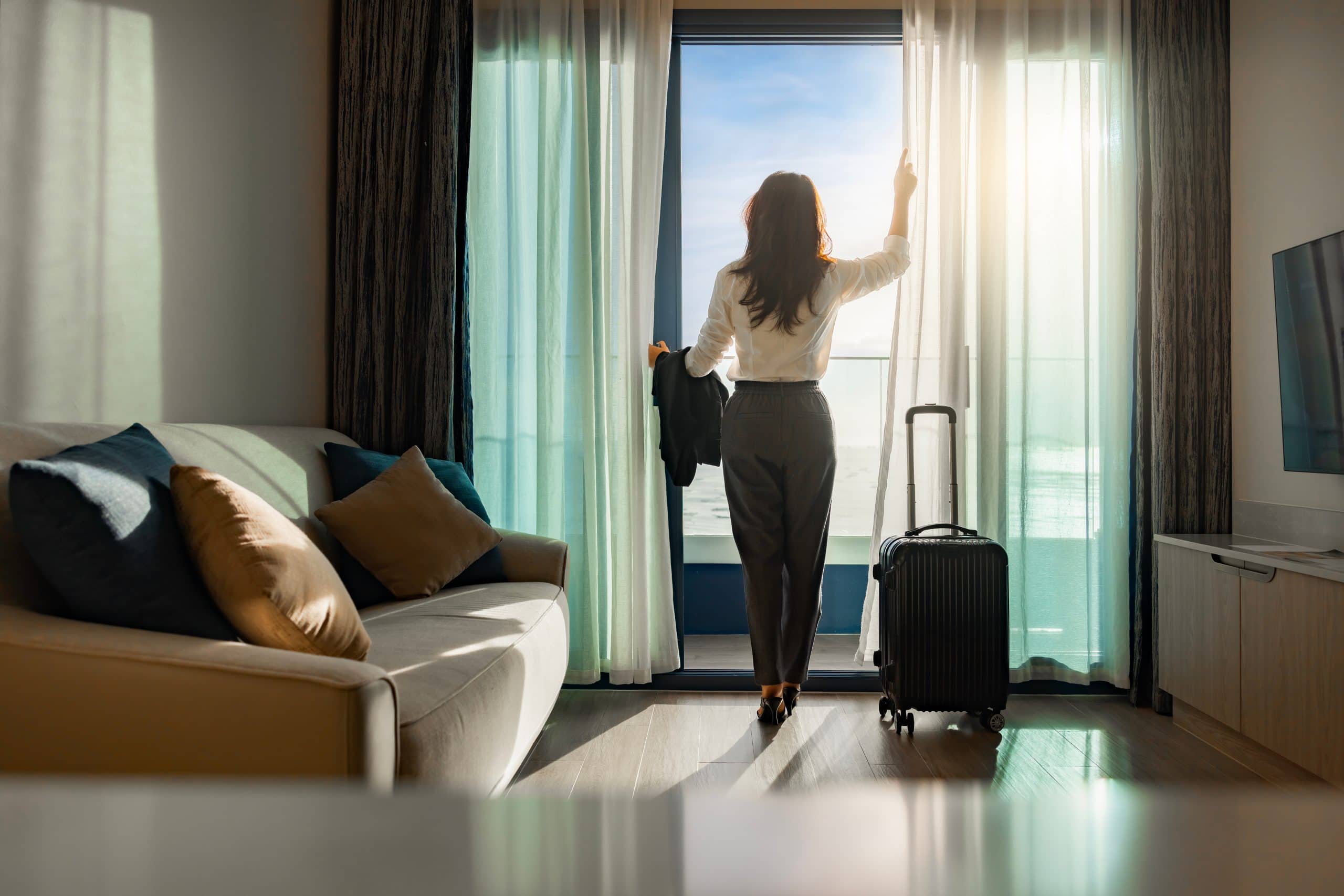 A businesswoman on a business trip, staying at a hotel for business travelers in Thailand.